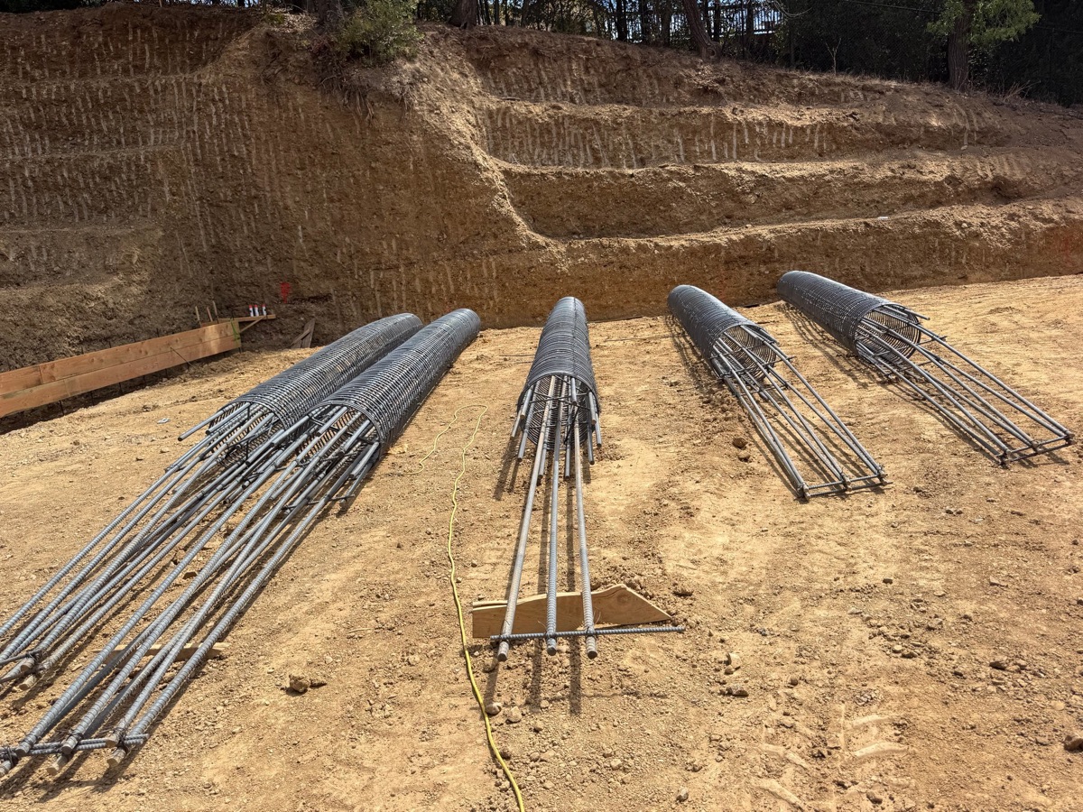 Reinforcing steel cages for hillside caisson foundations