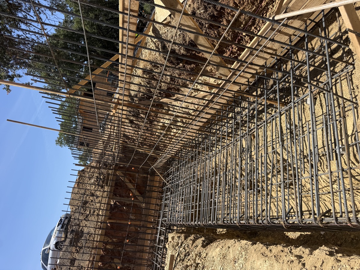 Reinforcing steel inspection for a hillside retaining wall