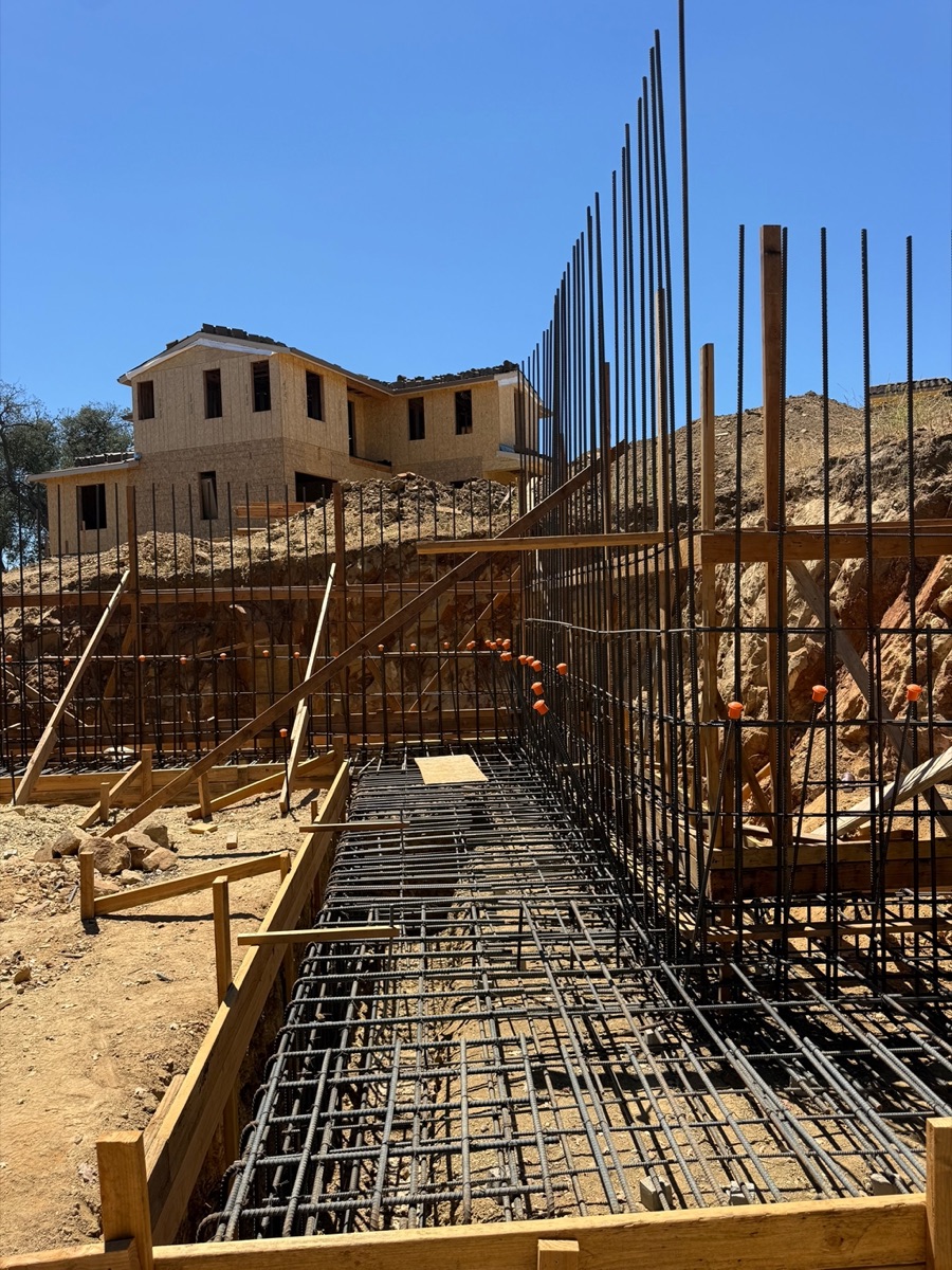 Retaining wall reinforcing steel inspection during residential construction