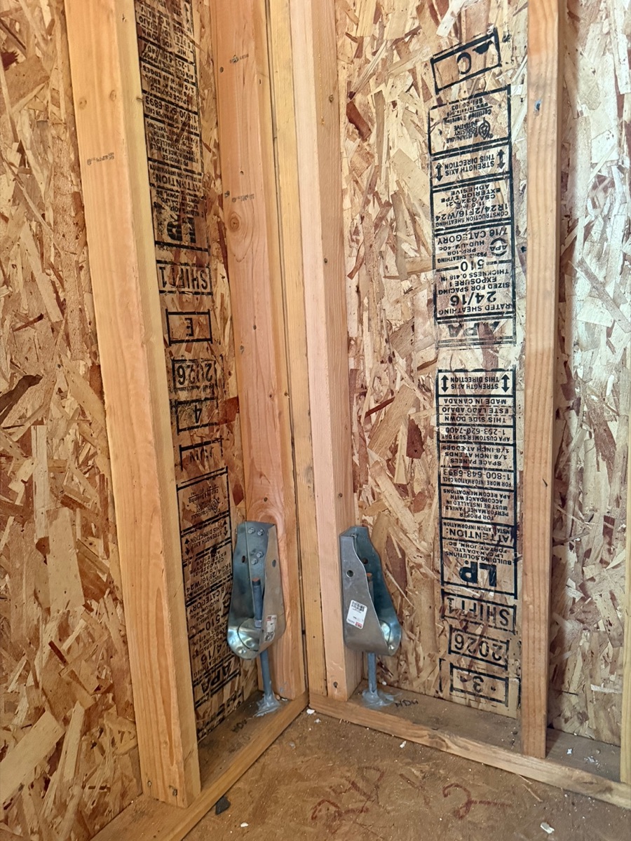Hold-down anchor and shear wall inspection at a seismic retrofit